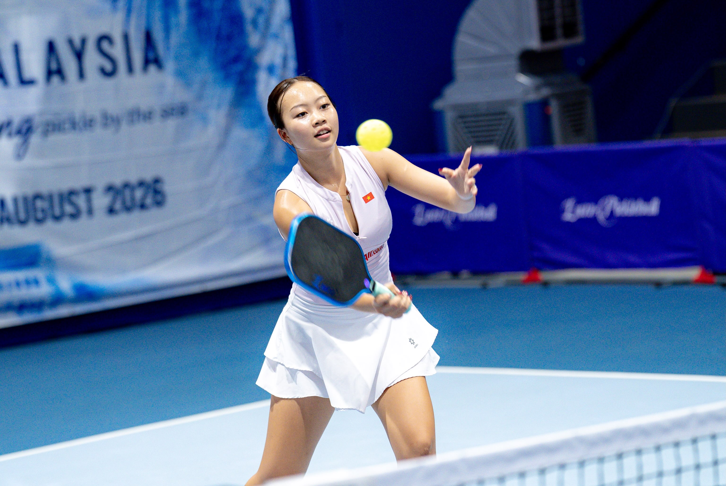 Sophia Tran Phuong Anh mid-rally during the exhibition match at Pickle By The Sea.