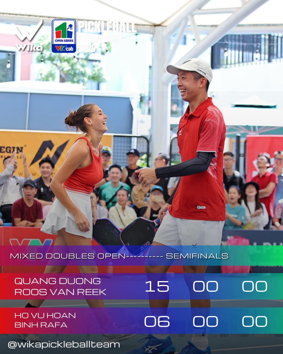 Quang Duong and Roos Van Reek at the net after the 15-6 Mixed Doubles Open semifinal