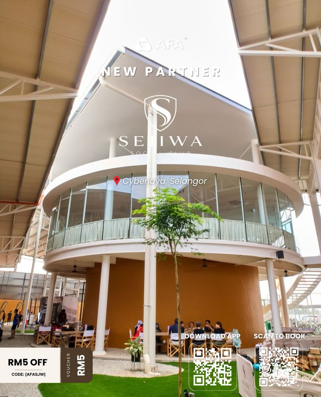 Circular two-storey clubhouse with an outdoor seating area at Sejiwa Social Club