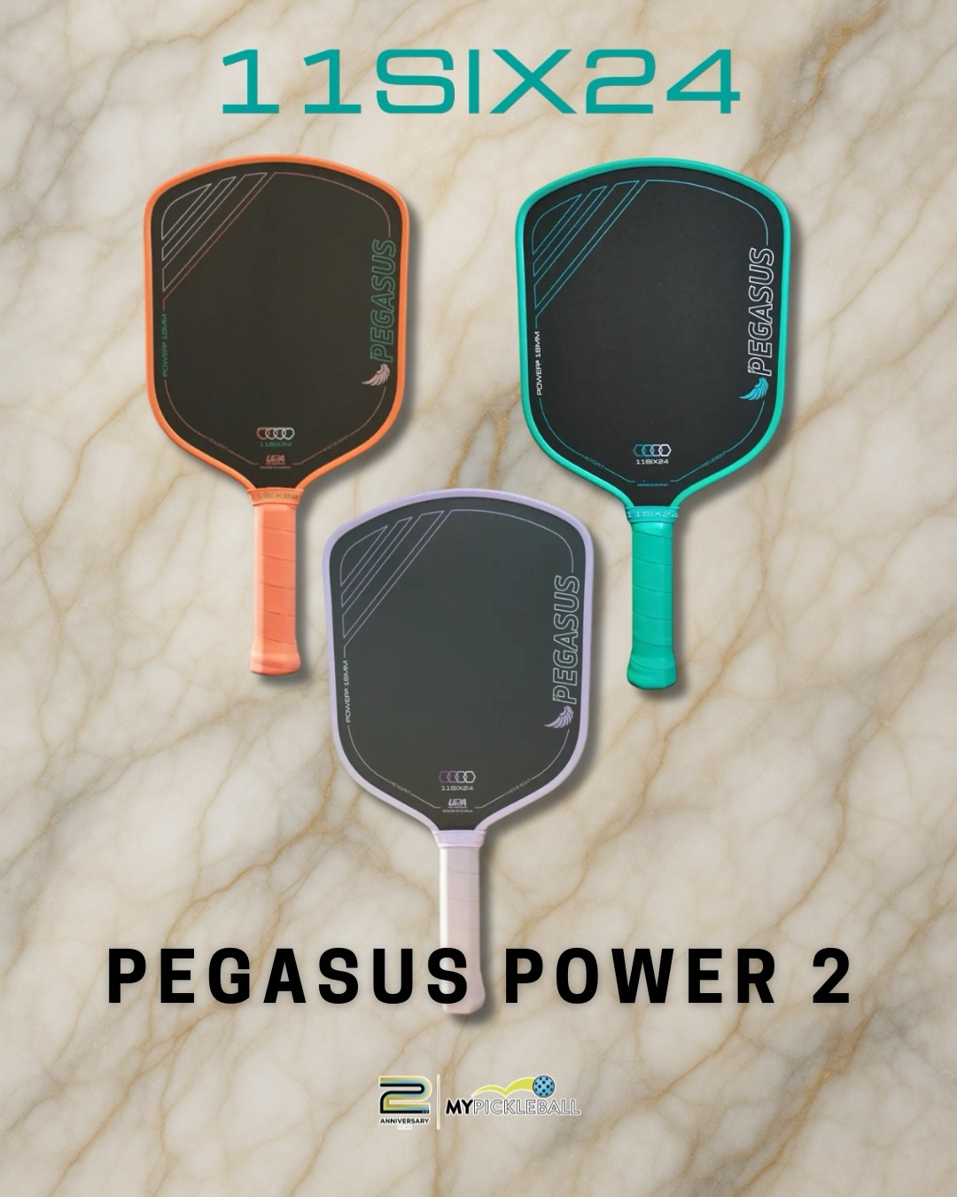 Three 11SIX24 Pegasus Power 2 paddles in orange, teal and lavender on a marble background.