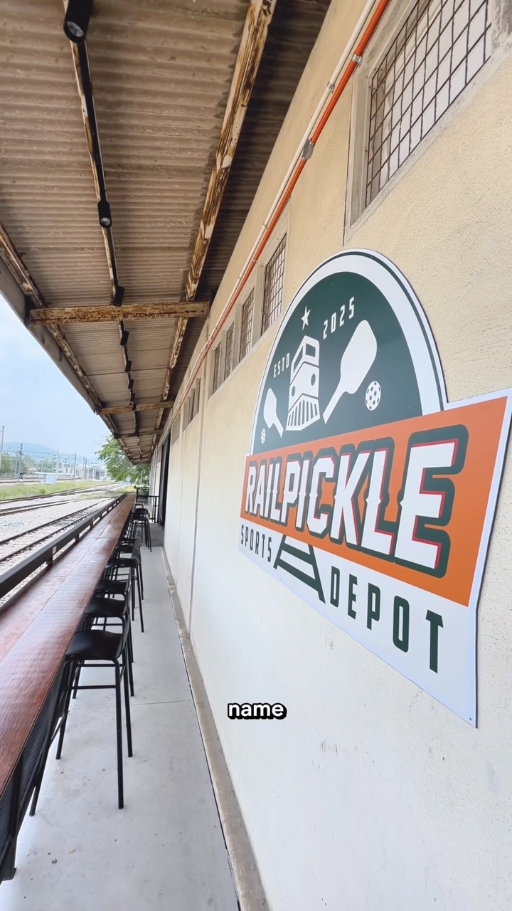 Rail Pickle Sports Depot signage beside the railway line at Pulau Sebang