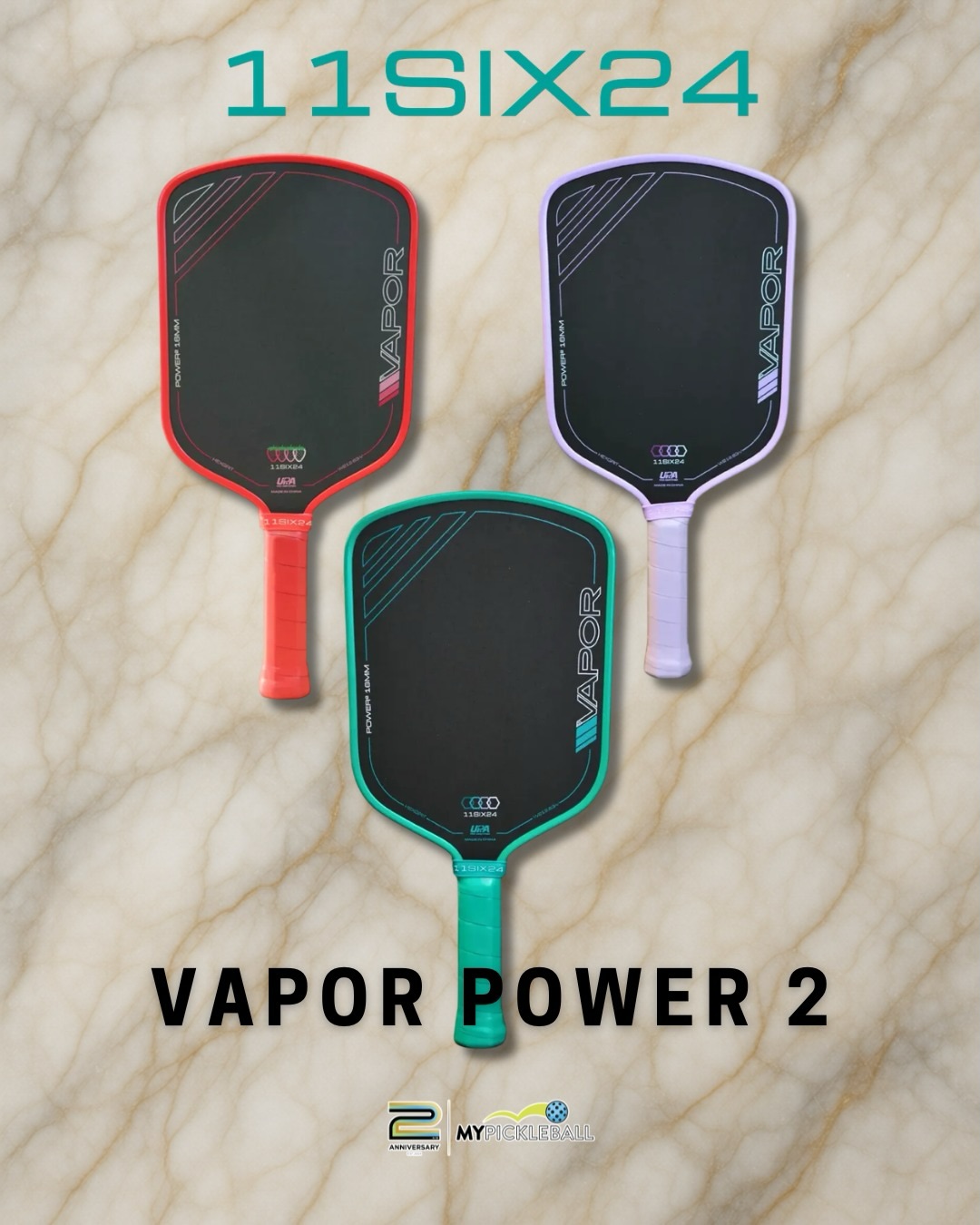 Three 11SIX24 Vapor Power 2 paddles in red, lavender and teal on a marble background.