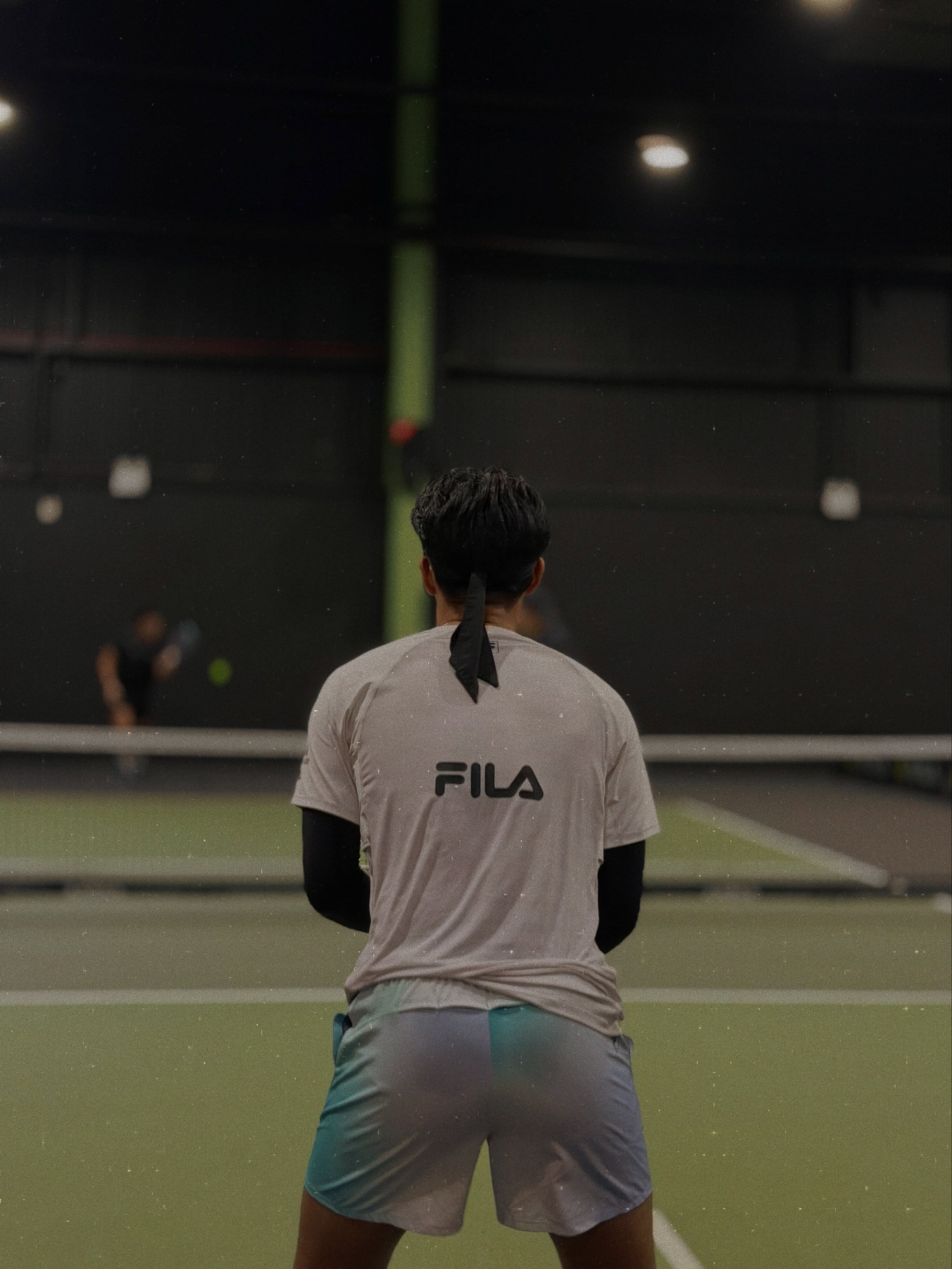 Syed Uzair wearing a FILA shirt on court at the VREW by Lenmis Pickleball Championship 2026