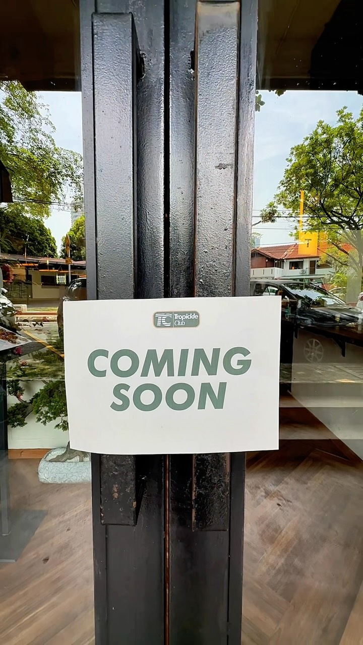 Coming Soon sign with the Tropickle Club logo at the venue entrance