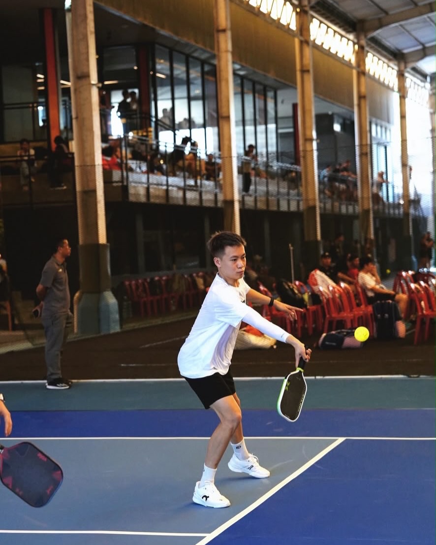 Lagger Chan mid-swing on court at WPC Bali
