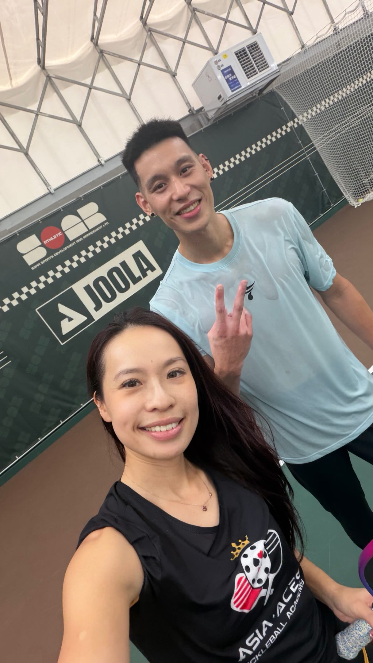 Venise Chan in her Asia Aces shirt on an indoor court in Macau