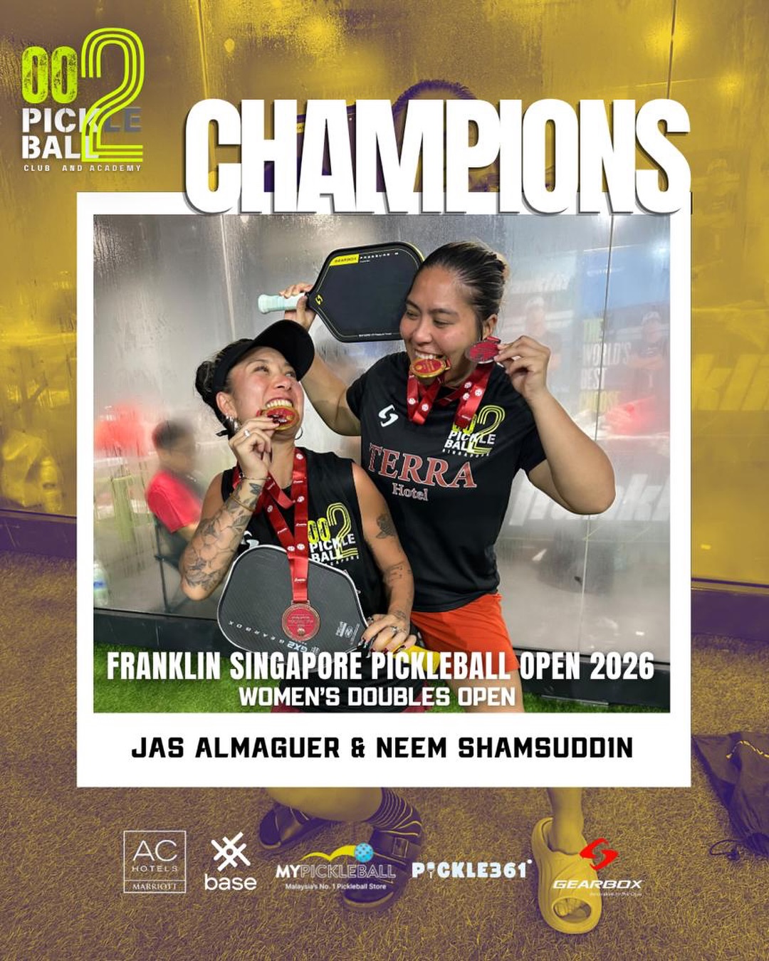 Neem Shamsuddin and Jas Almaguer biting their Franklin Singapore Pickleball Open medals