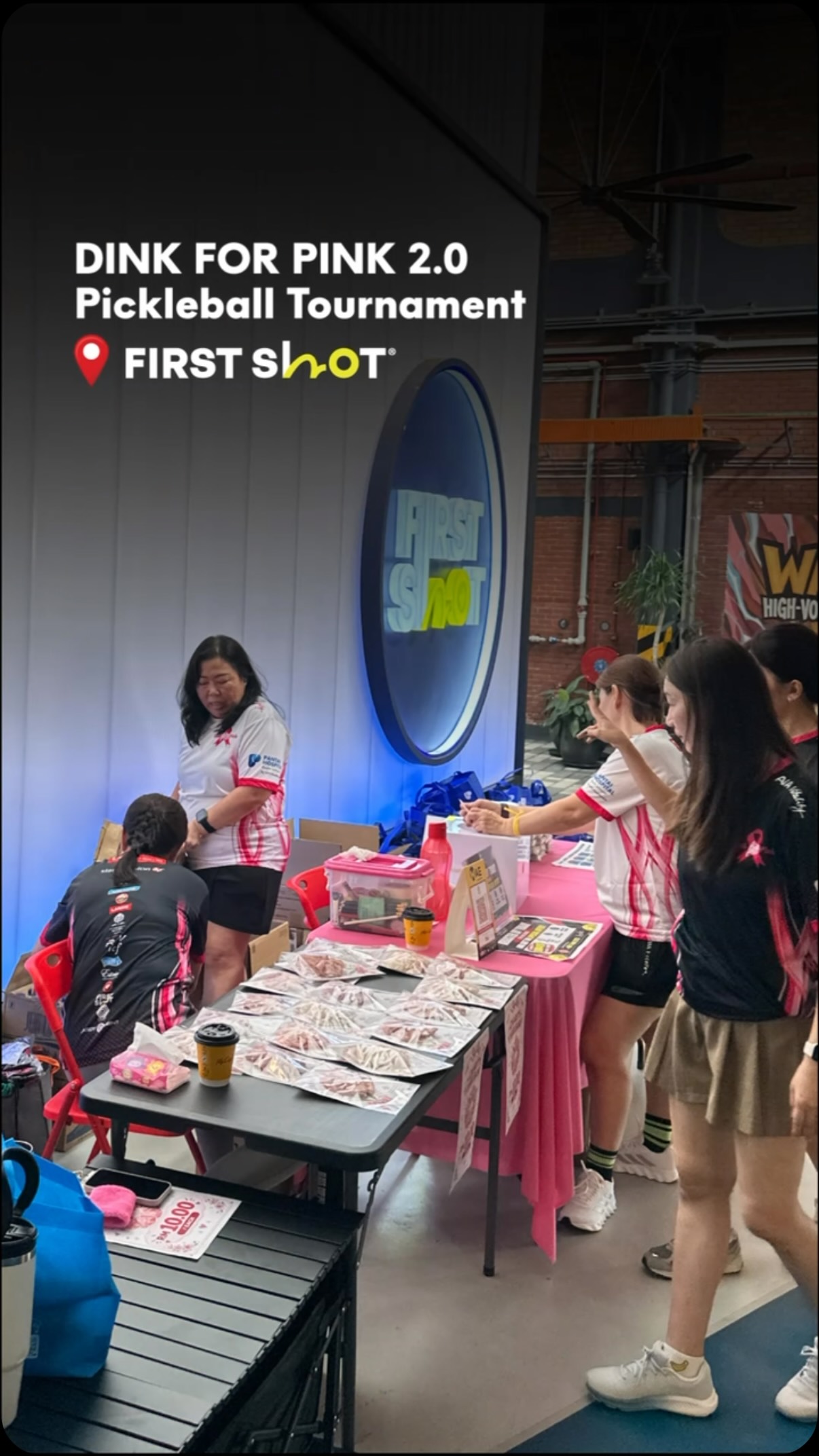 Dink For Pink 2.0 merchandise and information tables at First Shot Pickleball