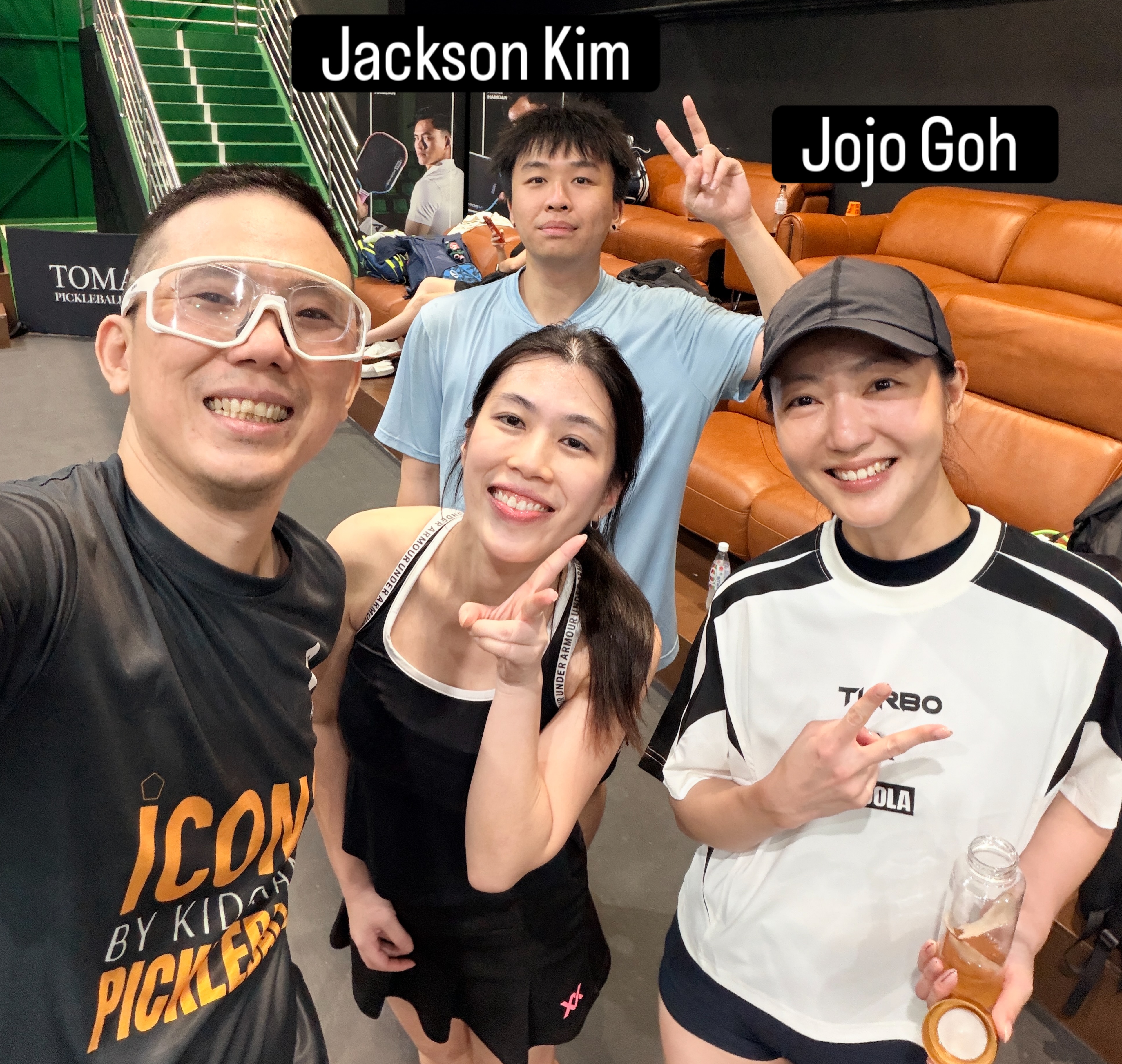 A group selfie in a pickleball venue; the slide labels read Jackson Kim and Jojo Goh.